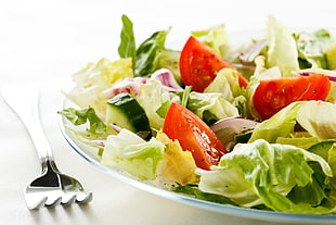 Salad on white ceramic plate